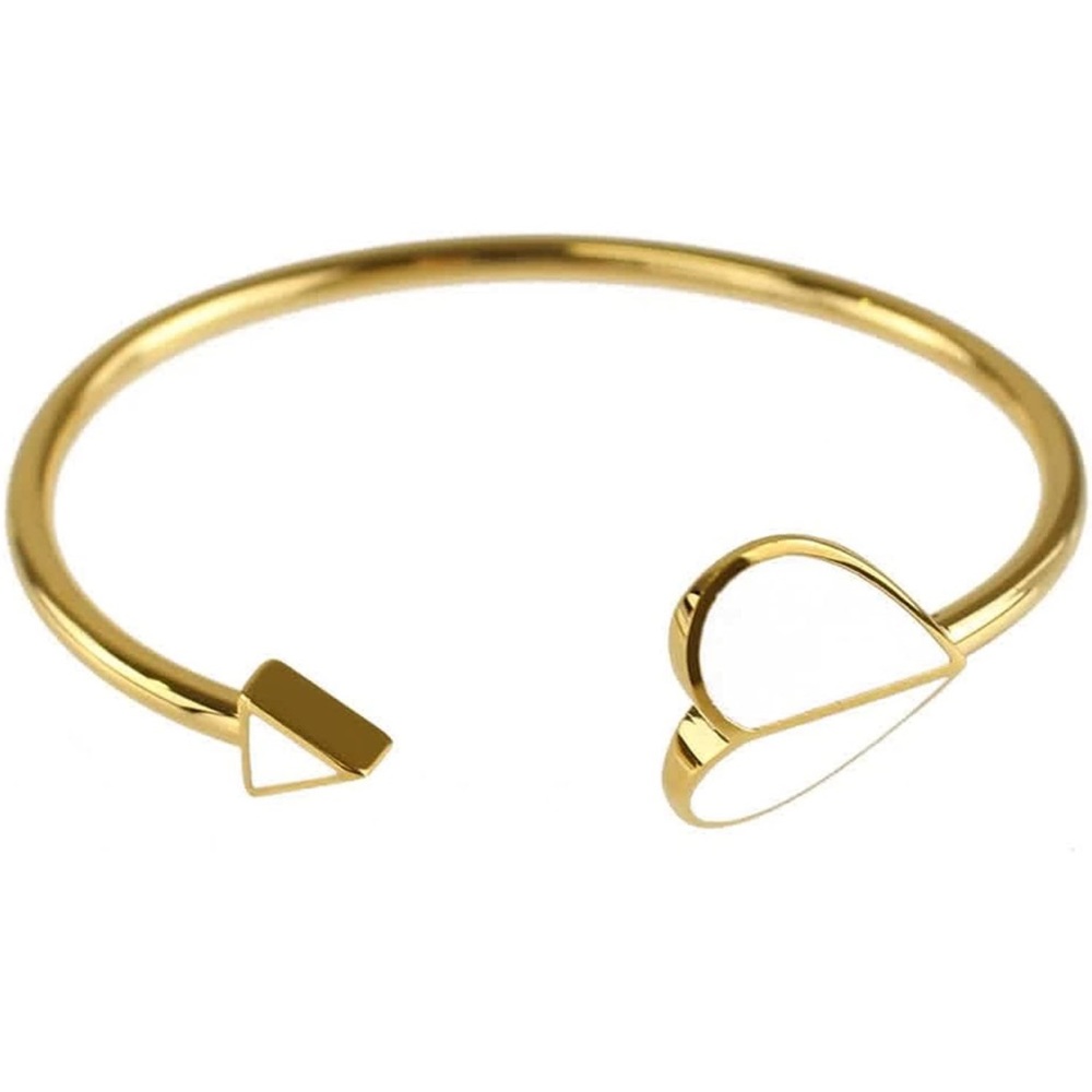 Kate Spade gold heart and arrow cuff bangle bracelet